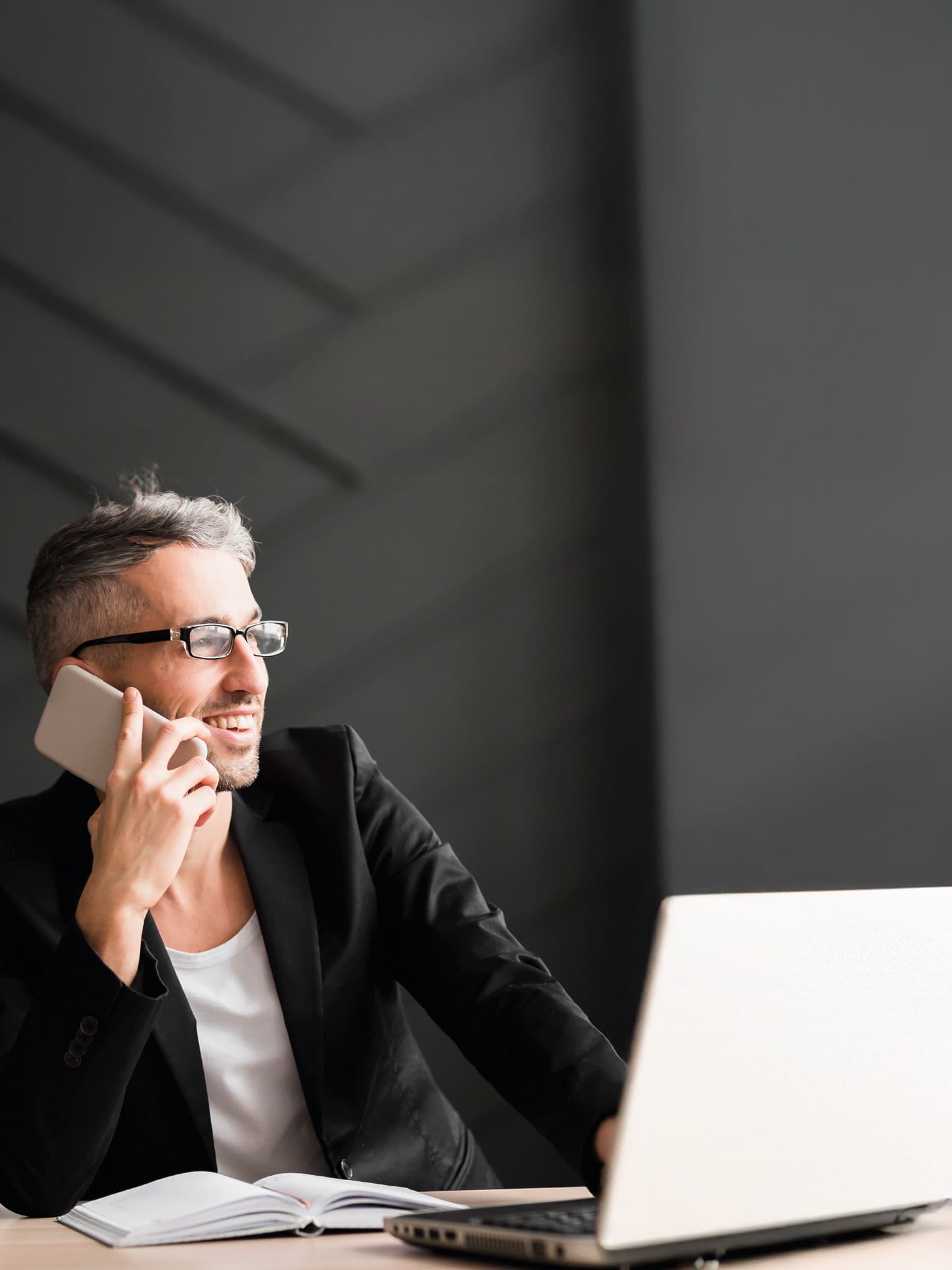 Professional on phone in modern office
